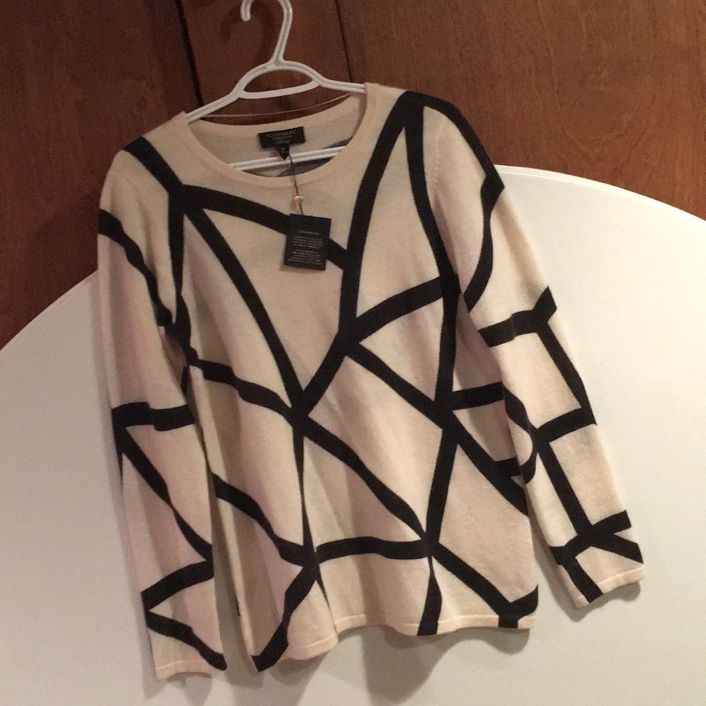 Black and cream sweater
